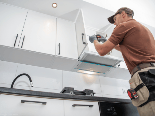 maintenance jobs fixing a cupboard in a kitchen